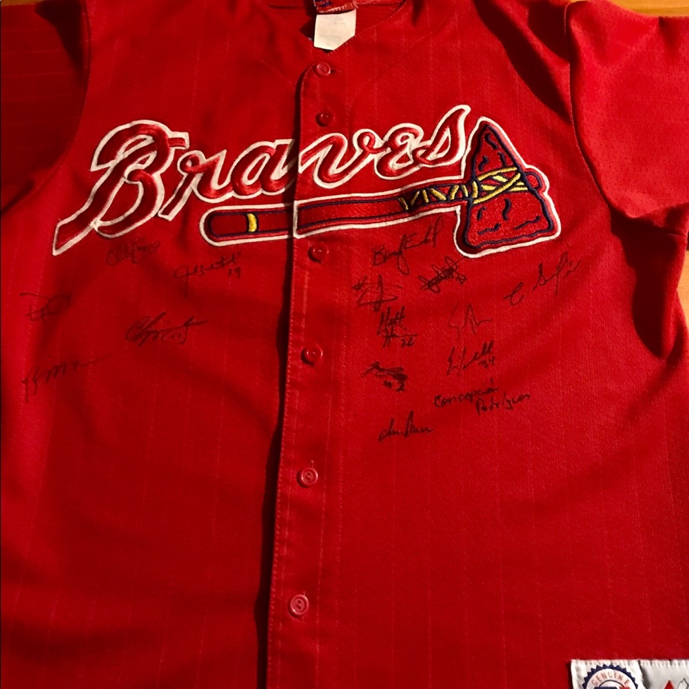 *"Braves Team Signed Game-Worn Jersey - Framed & Authenticated"*